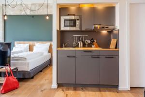Staycity Aparthotels Leipzig City Centre客房内的一张或多张床位