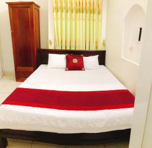 Postel nebo postele na pokoji v ubytování Đức Trọng Hotel
