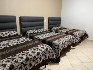 Postel nebo postele na pokoji v ubytování Hotel Posada Ruiseñor