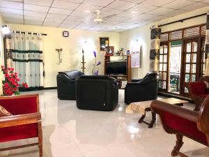Posezení v ubytování Sigiri Saman Home Stay