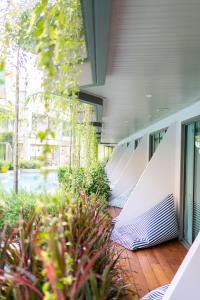 Zahrada ubytování Panwaburi Beachfront Resort - SHA Extra Plus