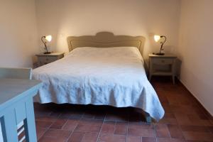 Ένα ή περισσότερα κρεβάτια σε δωμάτιο στο Agriturismo Mirasole +29 φωτογραφίες