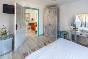 Postel nebo postele na pokoji v ubytování Casa Santa