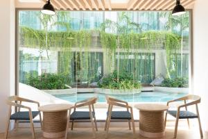 Zahrada ubytování Panwaburi Beachfront Resort - SHA Extra Plus