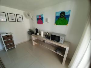TV a/nebo společenská místnost v ubytování STUDIO S at JAN THIEL Curacao