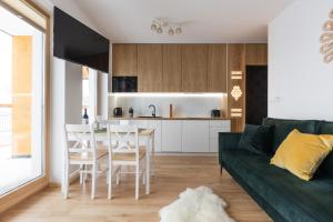Kuchyňa alebo kuchynka v ubytovaní Apartamenty Parzenica Zakopane