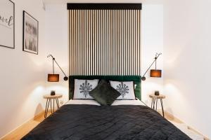 Posteľ alebo postele v izbe v ubytovaní Apartamenty Parzenica Zakopane