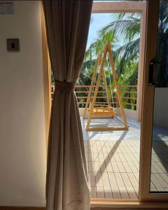 Balkón nebo terasa v ubytování Finolhu Beach Guest House