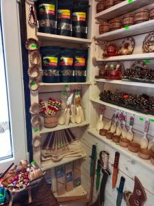 a refrigerator filled with lots of different types of items at Під горою 2 in Sheshory