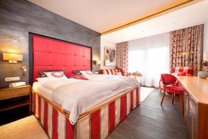 Ein Bett oder Betten in einem Zimmer der Unterkunft Hotel Sommer-Haus am See