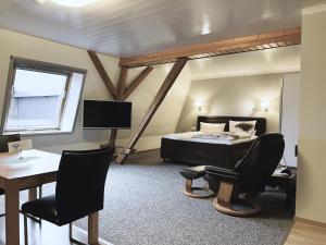 TV a/nebo společenská místnost v ubytování Gästezimmer & Appartement Elskop