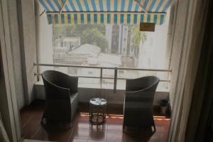 Posezení v ubytování Orbett Hotel