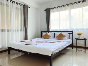 สวัสดีปัวโฮมสเตย์ Sawaddee Pua Homestay客房内的一张或多张床位