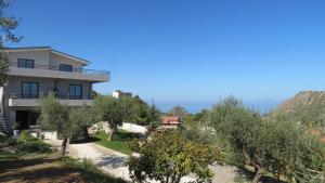 a villa with a view of the mountains at La Casa del Riccio in Tindari