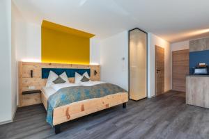 Postel nebo postele na pokoji v ubytování Lichti´s Rooms & Appartements