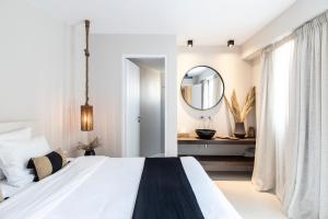 Ein Bett oder Betten in einem Zimmer der Unterkunft Nimbus My Aktis