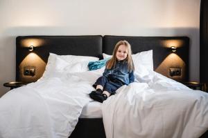 Voodi või voodid majutusasutuse Hotel Bradabella - Montafon toas