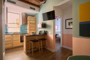 A kitchen or kitchenette at Casa Cosi - Putxet 2