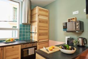 A kitchen or kitchenette at Casa Cosi - Putxet 2