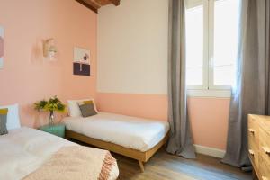 Posteľ alebo postele v izbe v ubytovaní Casa Cosi - Putxet 2