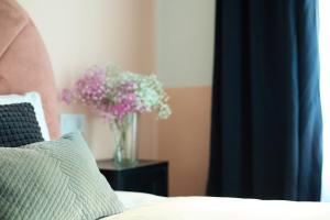 A bed or beds in a room at Casa Cosi - Putxet 2