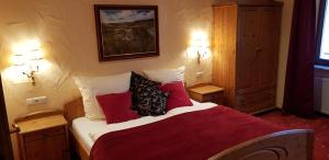 מיטה או מיטות בחדר ב-Hotel Anker