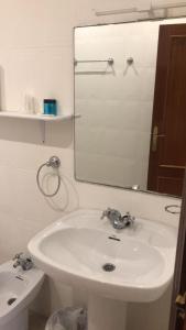 Ванна кімната в HOTEL EL COMENDADOR