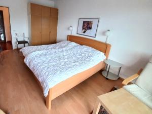 Voodi või voodid majutusasutuse LB3 Seeblick Appartement Haus Landskron direkt am Ossiachersee toas