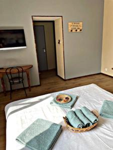 Cama ou camas em um quarto em Auberge du Raddon