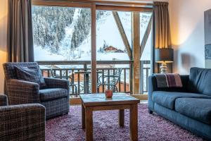 A seating area at Oasis Les Portes du Soleil Mountain Resort
