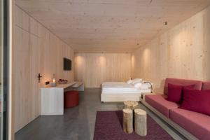 Postel nebo postele na pokoji v ubytování Bio-Hotel Oswalda-Hus