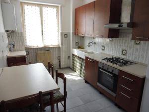 Kuchyň nebo kuchyňský kout v ubytování Casa Giulia