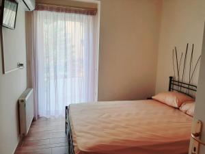A bed or beds in a room at Lovely house