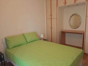A bed or beds in a room at Lovely house