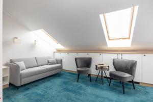 Posezení v ubytování Aparthotel Esencja Warszawy Nowy Świat