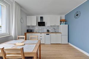 Kuchyň nebo kuchyňský kout v ubytování Grand Apartments - Summer - Apartament Gdańsk