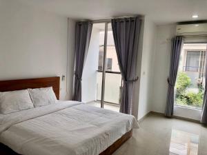 Postel nebo postele na pokoji v ubytování BK Hotel