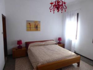 Posteľ alebo postele v izbe v ubytovaní A due passi dall'antico Ghetto, sestiere di Cannaregio