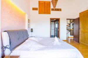 Posteľ alebo postele v izbe v ubytovaní Elena's Country Home & SPA
