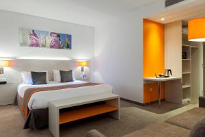 Postel nebo postele na pokoji v ubytování Best Western Colmar Expo