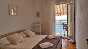 Postel nebo postele na pokoji v ubytování Apartment Juta