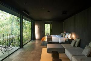Voodi või voodid majutusasutuse Rio Perdido Hotel & Thermal River toas