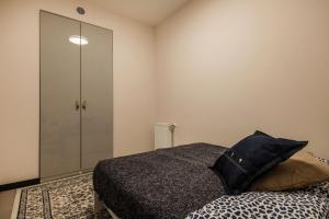 Posteľ alebo postele v izbe v ubytovaní Krane Apartments Ó utca