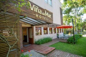 a building with a sign that reads wine walk hotel at Hotel Viña del Mar in Ostende