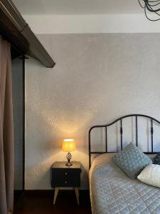 Llit o llits en una habitació de Атмосферные апартаменты с сауной и видом на парк