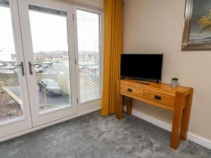 TV a/nebo společenská místnost v ubytování Market Lounge