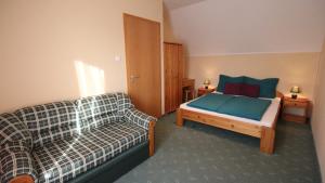 Posteľ alebo postele v izbe v ubytovaní Mandula Wellness Apartmanház