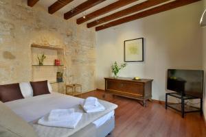 Postel nebo postele na pokoji v ubytování Ramón Llull House