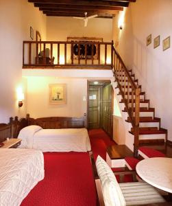 Postel nebo postele na pokoji v ubytování HOTEL SPA MONTANA