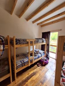 a bedroom with two bunk beds in a room at Las zarinas 1 in Trapiche